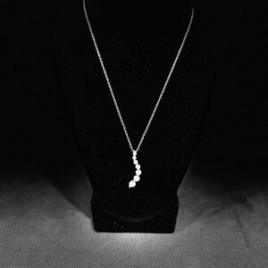 Dazzling Silver Necklace with Crystal Details